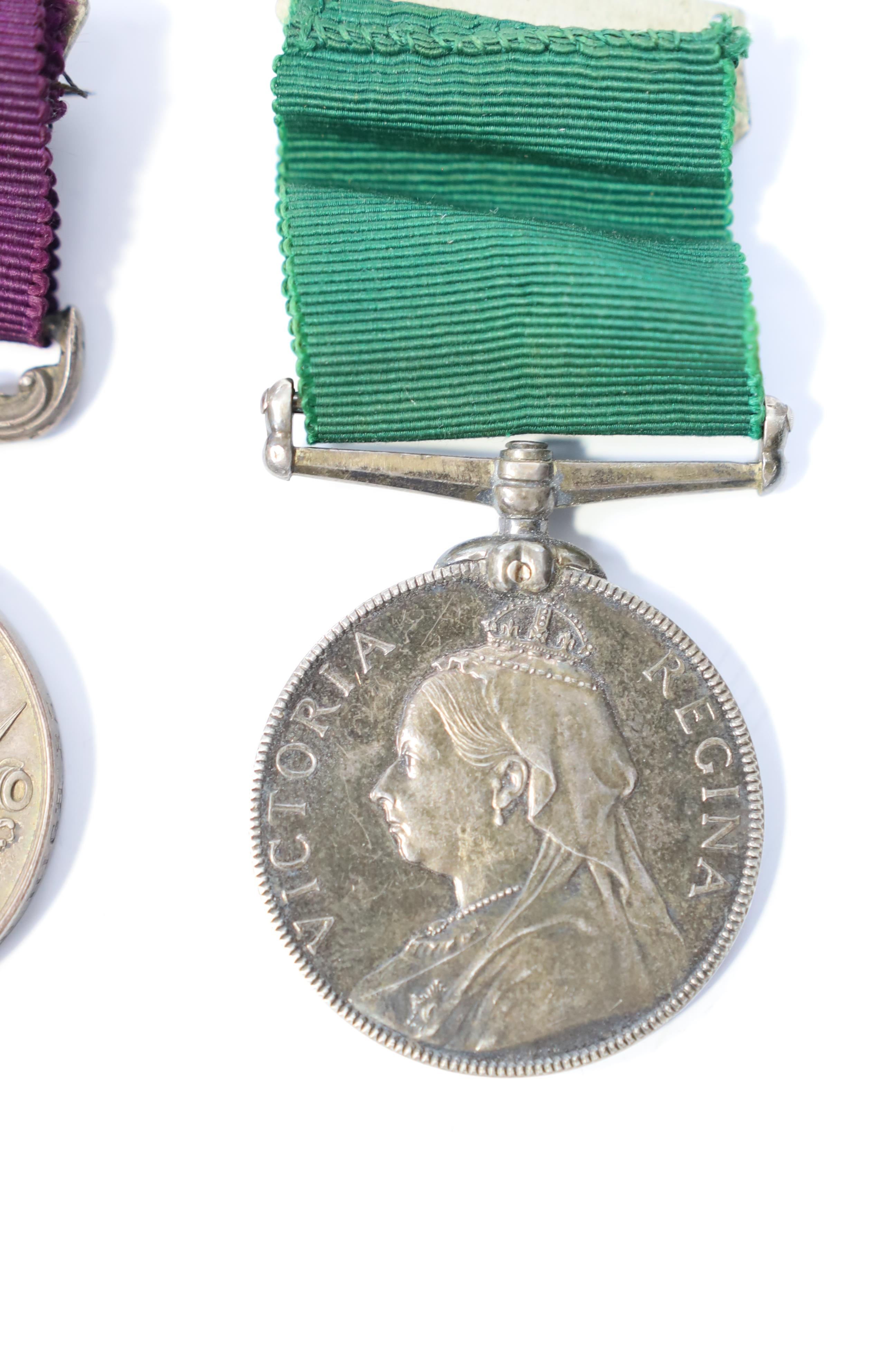 A Victorian LSGC medal to 1843 C:Sgt J.Cook. Gord. High'rs. and an unnamed Victorian Volunteer Long Service medal. Condition - fair